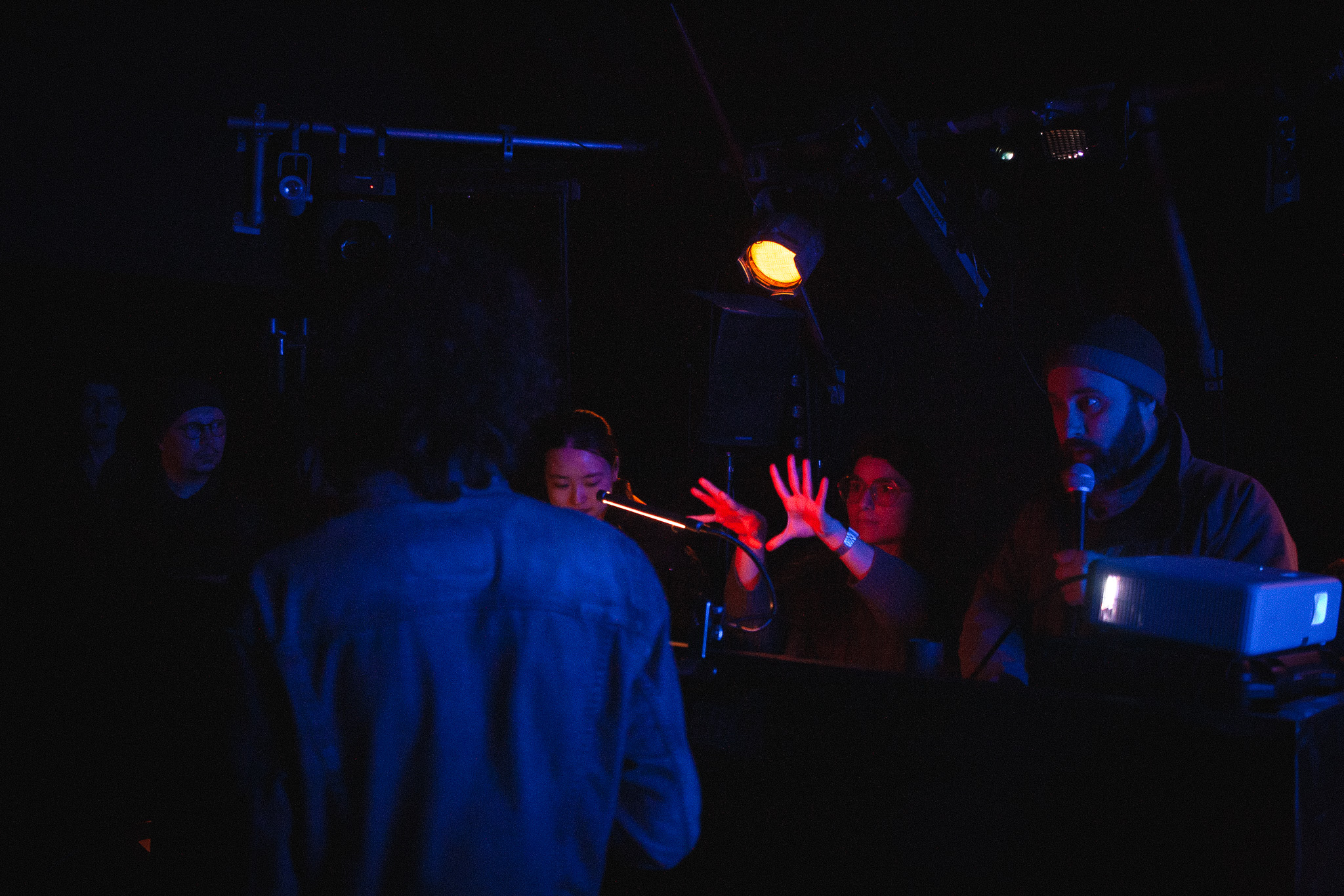 laura holding up her hand to cast the projection