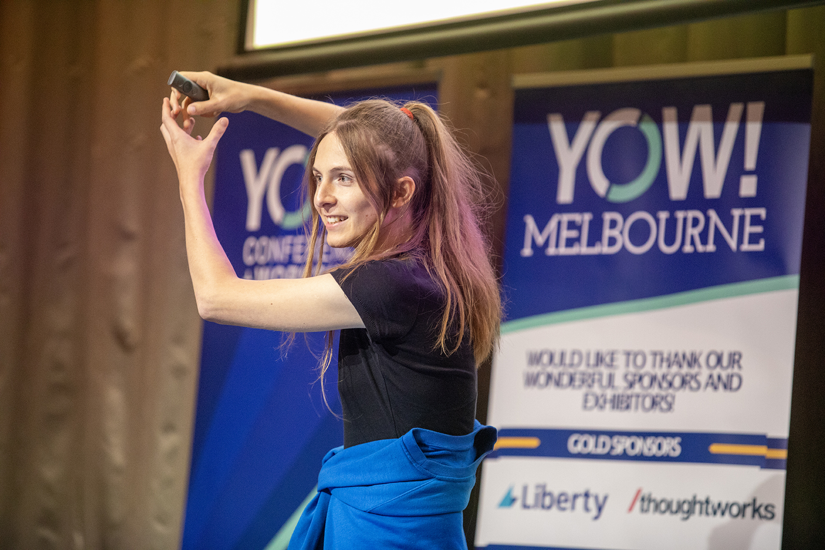 me standing in front of a screen that says Beyond chat